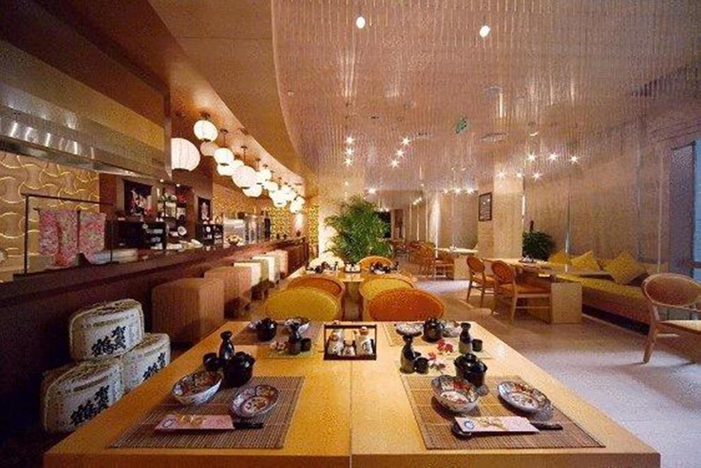 New Century Grand Hotel Кайфенг Екстериор снимка